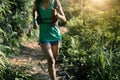 woman trail runner running in morning forest Royalty Free Stock Photo