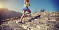 Runner running upstairs on the great wall top of mountain Royalty Free Stock Photo