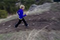 Woman trail running in mountains Royalty Free Stock Photo