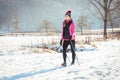 Woman on the trail for a winter hike Royalty Free Stock Photo