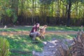 Woman trainer caressing cheetah atTampa Bay area.