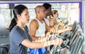 Woman training on elliptical trainer in gym Royalty Free Stock Photo