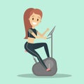 Woman training on the exercise bike in the gym. Royalty Free Stock Photo