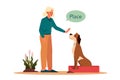 Woman training her pet dog. Happy puppy having command lesson. Royalty Free Stock Photo