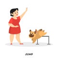 Woman training her pet dog. Jump command Royalty Free Stock Photo