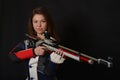 Woman training sport shooting with air rifle gun Royalty Free Stock Photo