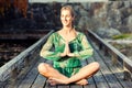 Woman training yoga outdoor in autumn Royalty Free Stock Photo