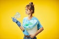 woman with trash can ecology pollution plastic trash Royalty Free Stock Photo