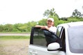 Woman travel by car to golf, woman loading a golf bag Royalty Free Stock Photo