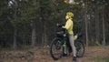 The woman travel on mixed terrain cycle touring with bike bikepacking. The traveler journey with bicycle bags. Magic