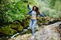 Woman travel in mountain river eco tourist Royalty Free Stock Photo