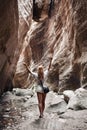 Woman traveler in amazing Avakas gorge, nature landscape, Cyprus. View of the popular canyon tourist Royalty Free Stock Photo