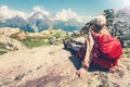 Woman Traveler with backpack admiring of mountains Royalty Free Stock Photo