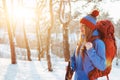 Woman Traveler with backpack hiking Travel Lifestyle adventure concept active vacations outdoor. Beautiful landscape forest Royalty Free Stock Photo