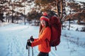 Woman Traveler with backpack hiking Travel Lifestyle adventure concept active vacations outdoor. Beautiful landscape Royalty Free Stock Photo