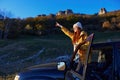 woman traveler black car nature travel adventure relaxation Royalty Free Stock Photo