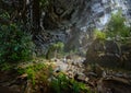 Woman traveler explores beautiful Hang Tien Cave in Phong Nha Ke National Park. Vietnam. Royalty Free Stock Photo