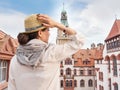 Woman traveler in hat enjoying Hannover City view