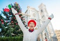 Woman traveler with Italian flag enjoying Christmas in Florence Royalty Free Stock Photo