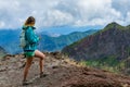 Woman traveler at Madeira mountain hiking path.