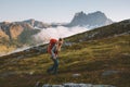 Woman traveler mountaineering with backpack adventure solo travel Royalty Free Stock Photo