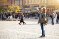 Woman traveler photographing landmark