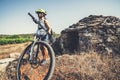 Woman traveler ride bicycle in Hvar, Croatia.