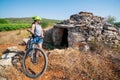 Woman traveler ride bicycle in Hvar, Croatia. Royalty Free Stock Photo