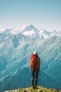 Woman Traveler standing at mountains