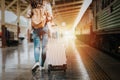 Woman traveler tourist walking with luggage