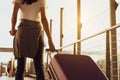 Woman traveler waiting airplane after booking ticket flight at airport Royalty Free Stock Photo