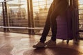 Woman traveler waiting airplane after booking ticket flight at airport Royalty Free Stock Photo