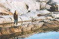 Woman traveling alone enjoying rocks view outdoor solo adventure trip