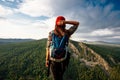 A woman is traveling in Bashkiria, Russia. Mountain tourism in Russia. Walking tour of the mountains of Bashkiria, Aigir.