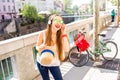 Woman traveling with bicycle in Ljubljana city Royalty Free Stock Photo