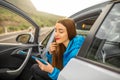 Woman traveling by car on the mountain road Royalty Free Stock Photo