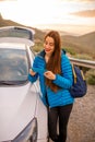 Woman traveling by car on the mountain road Royalty Free Stock Photo