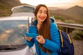 Woman traveling by car on the mountain road Royalty Free Stock Photo