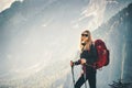 Woman traveling hiking with backpack at mountains Royalty Free Stock Photo