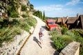 Woman traveling in La Roque Gageac village, France