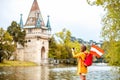 Woman traveling near the austrian castle Royalty Free Stock Photo