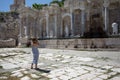 woman traveller photographing agora at ancient city of Sagalassp