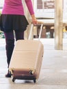 Woman traveller in airport walkway. Travel concept. Royalty Free Stock Photo