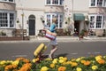 Woman travelling alone in seaside town Royalty Free Stock Photo