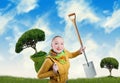 Woman with tree and spade Royalty Free Stock Photo