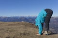 Woman trekker relaxing in mountains