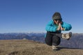 Woman trekker relaxing in mountains