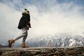 Woman trekking in the Himalayan mountains