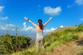 Woman trekking in mountains, hiking tourist