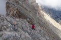 Woman trekking on mystical hiking trail leading to Mount Olympus Mytikas, Skala, Stefani in Mt Olympus National Park